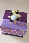 PEARL ONYX ARROW RING